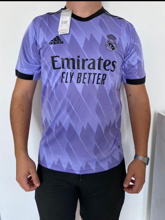 Purple Real Madrid football shirt